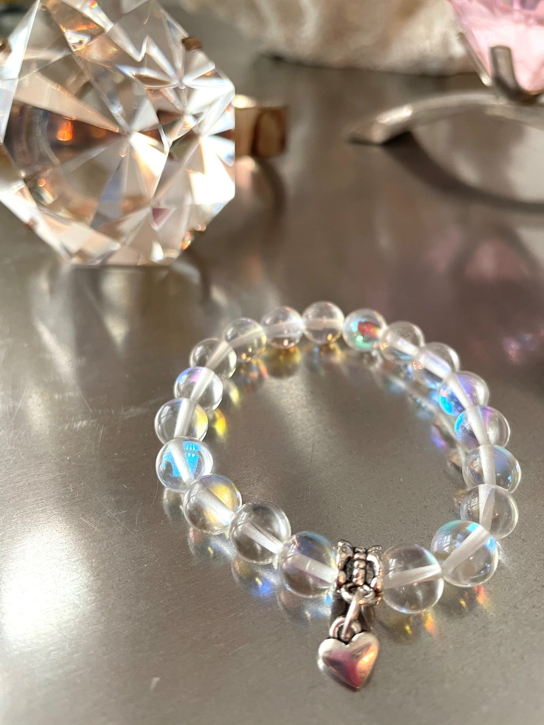 clear mystic quartz mala bracelet heart charm comotocapri