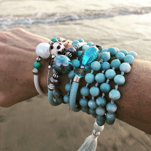 bracelet stack italian wrap leather and rubber cord bracelets murano glass mala necklace blue quartz como to capri comotocapri